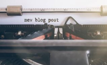 new blog post text displayed on a typewriter